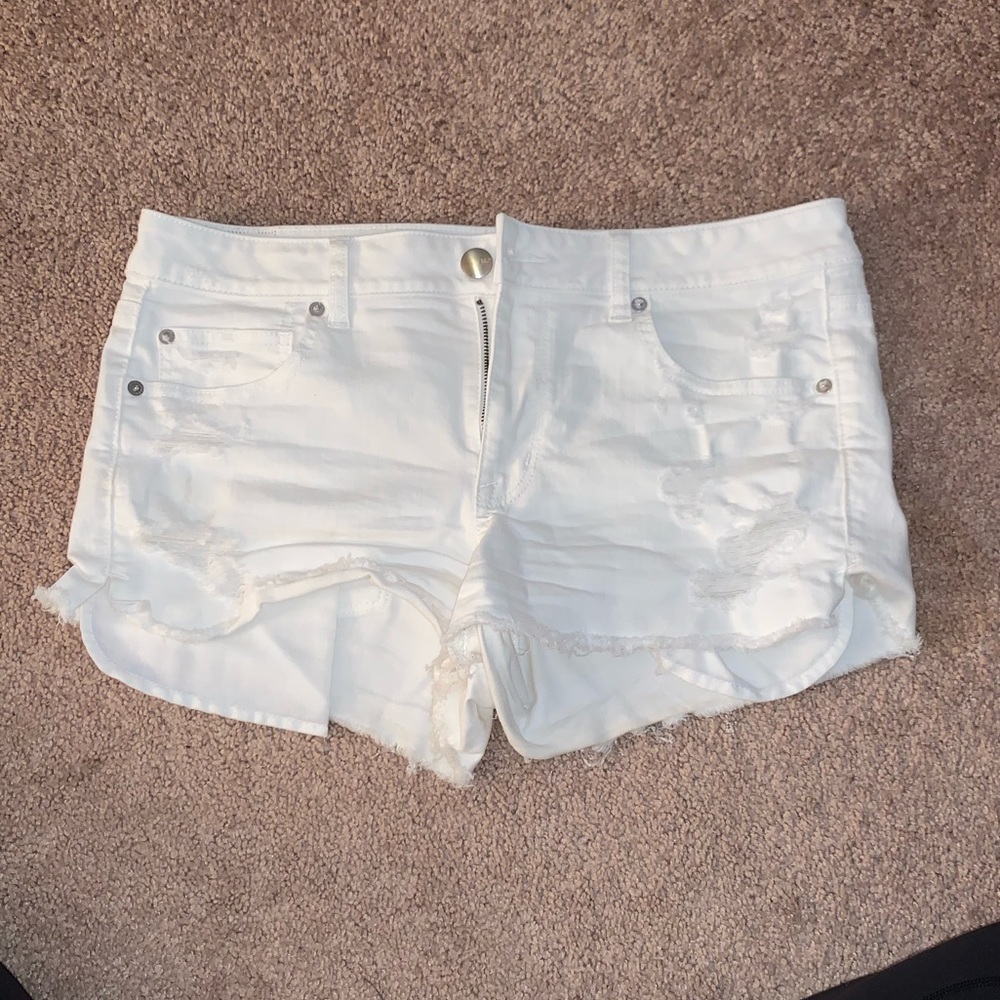 white ripped jean shorts